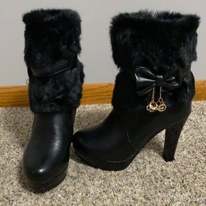 New, never worn, black furry detail boots with faux leather ribbon and bow